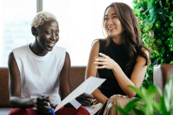 two women collaborating on mental health